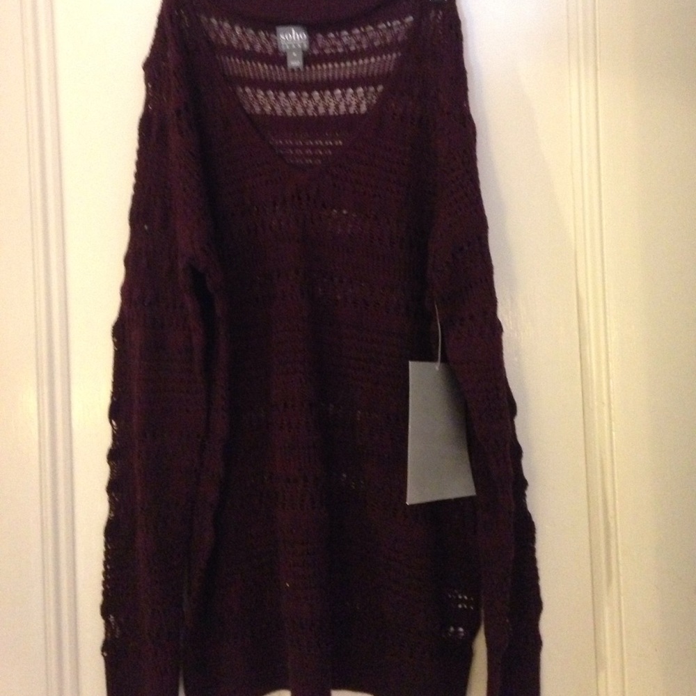 Red mahogany ribbed deep v neck.
